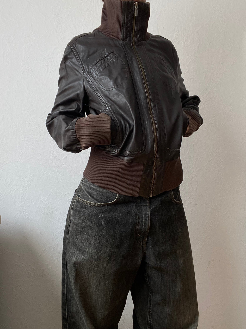 Vintage genuine leather short bomber jacket with natural patina