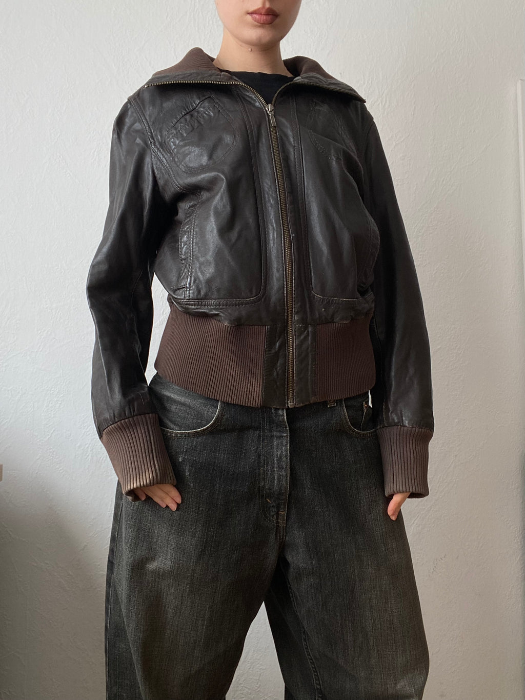 Vintage genuine leather short bomber jacket with natural patina
