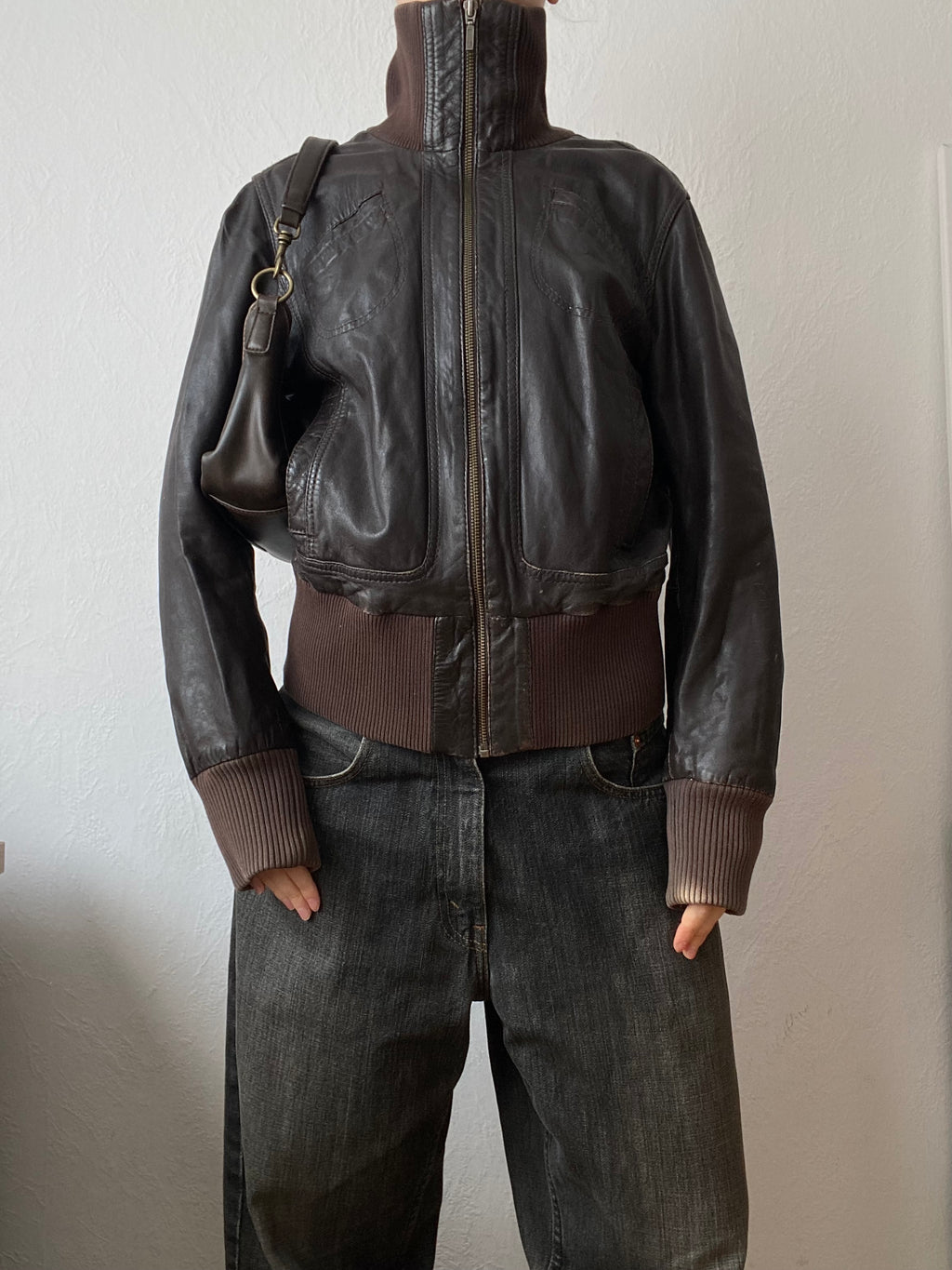 Vintage genuine leather short bomber jacket with natural patina