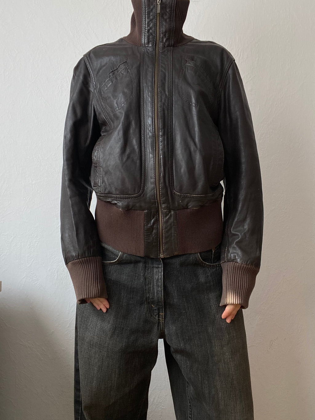 Vintage genuine leather short bomber jacket with natural patina